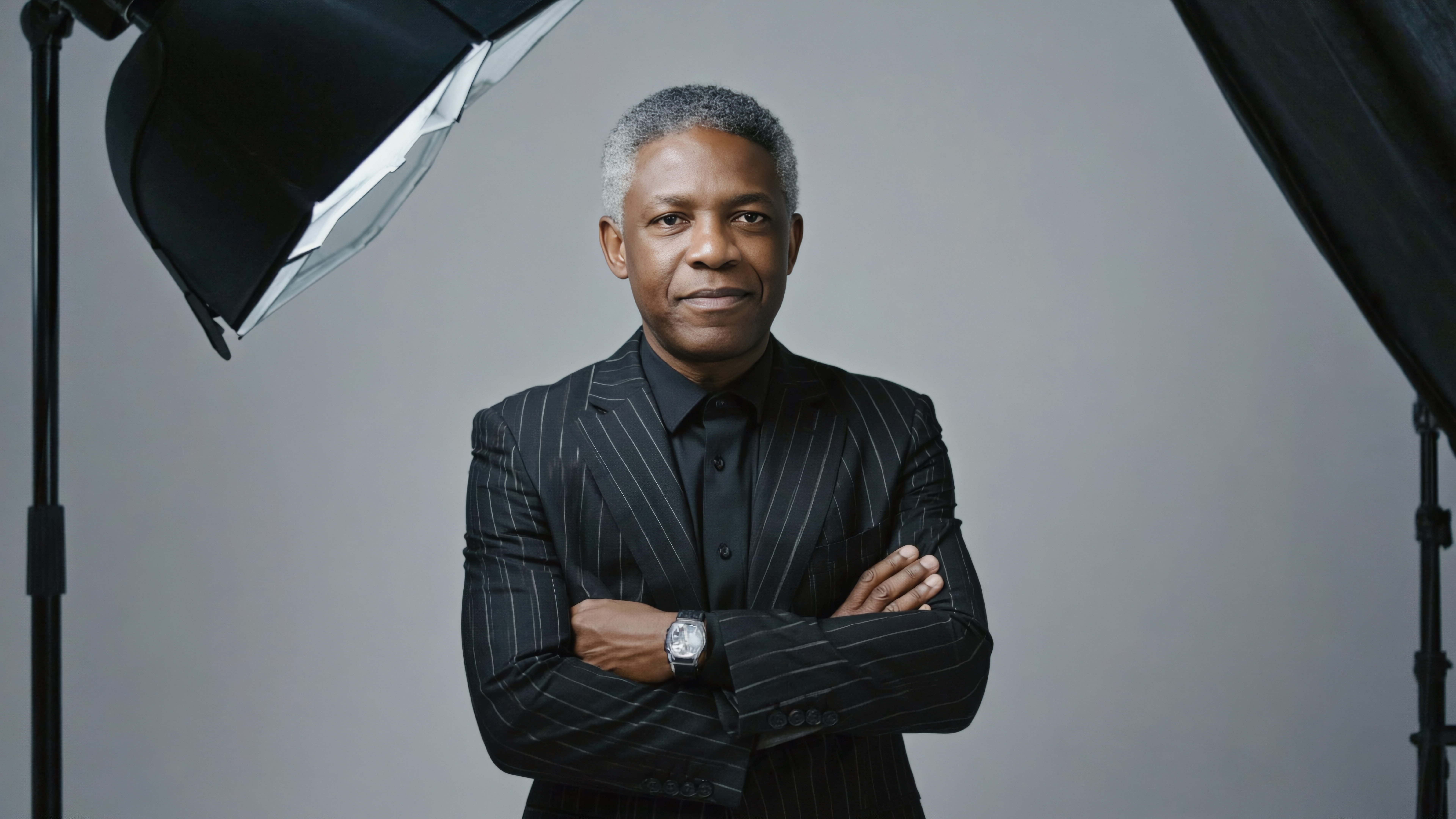 Man in a professional suit at a photo shoot