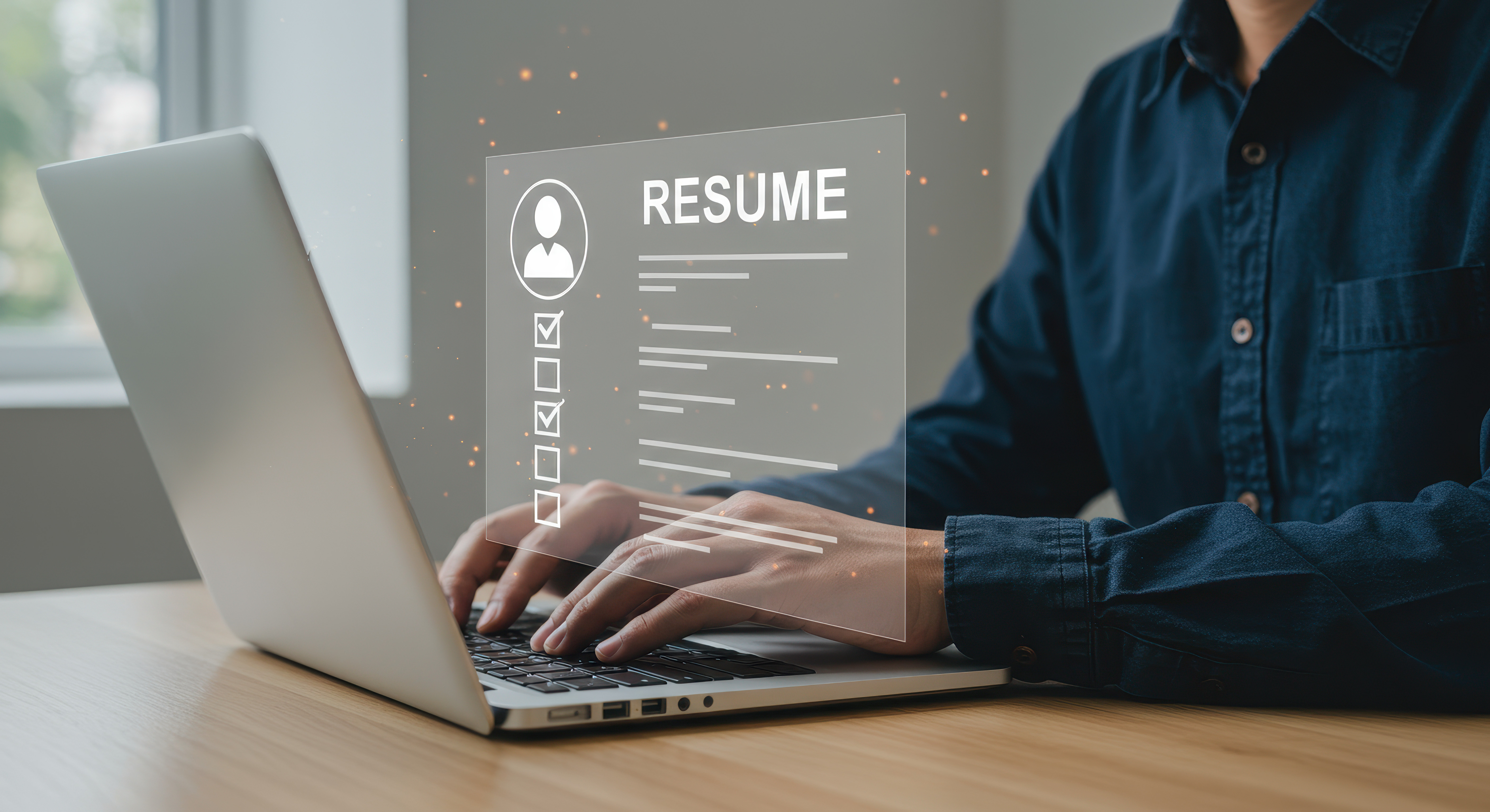 Person completing a resume with futuristic computer projection