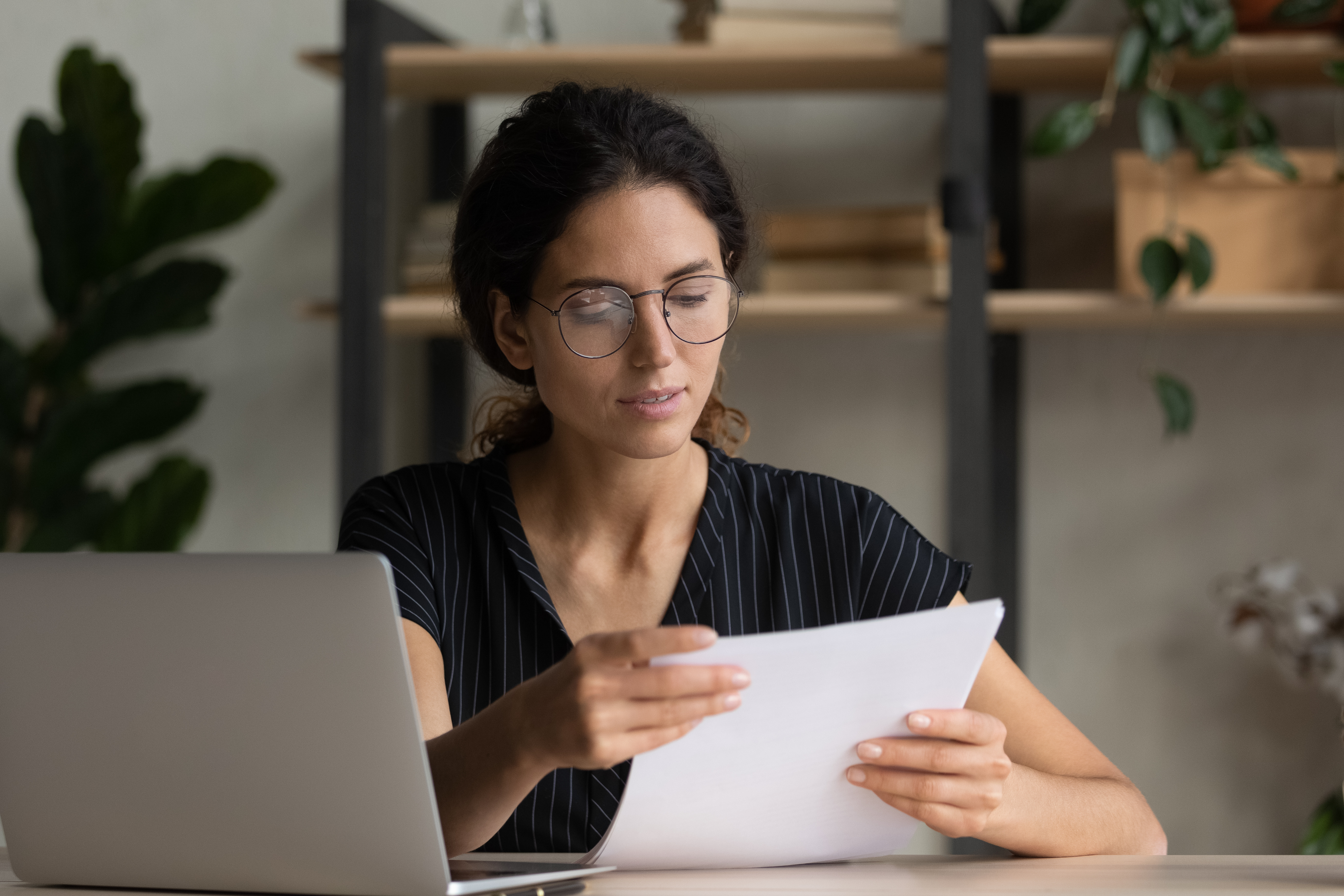 Woman reviewing her cover letter